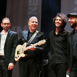 a group of men standing next to each other